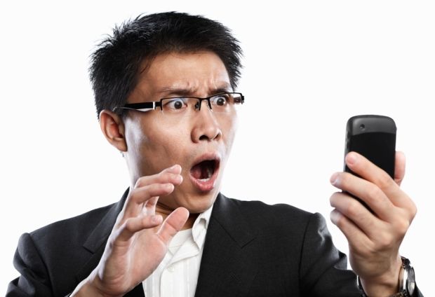 shocked-man-with-phone-6201_zpsyavbbu8y.jpg